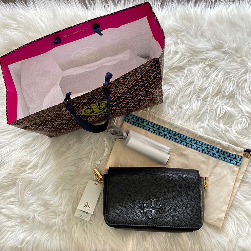 Black Thea mini bag with tassels and black/gold chain. Includes duster bag.